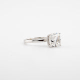 Cushion Cut Engagement Ring in 14kt white gold with a 4.10 ct center stone and side stones.