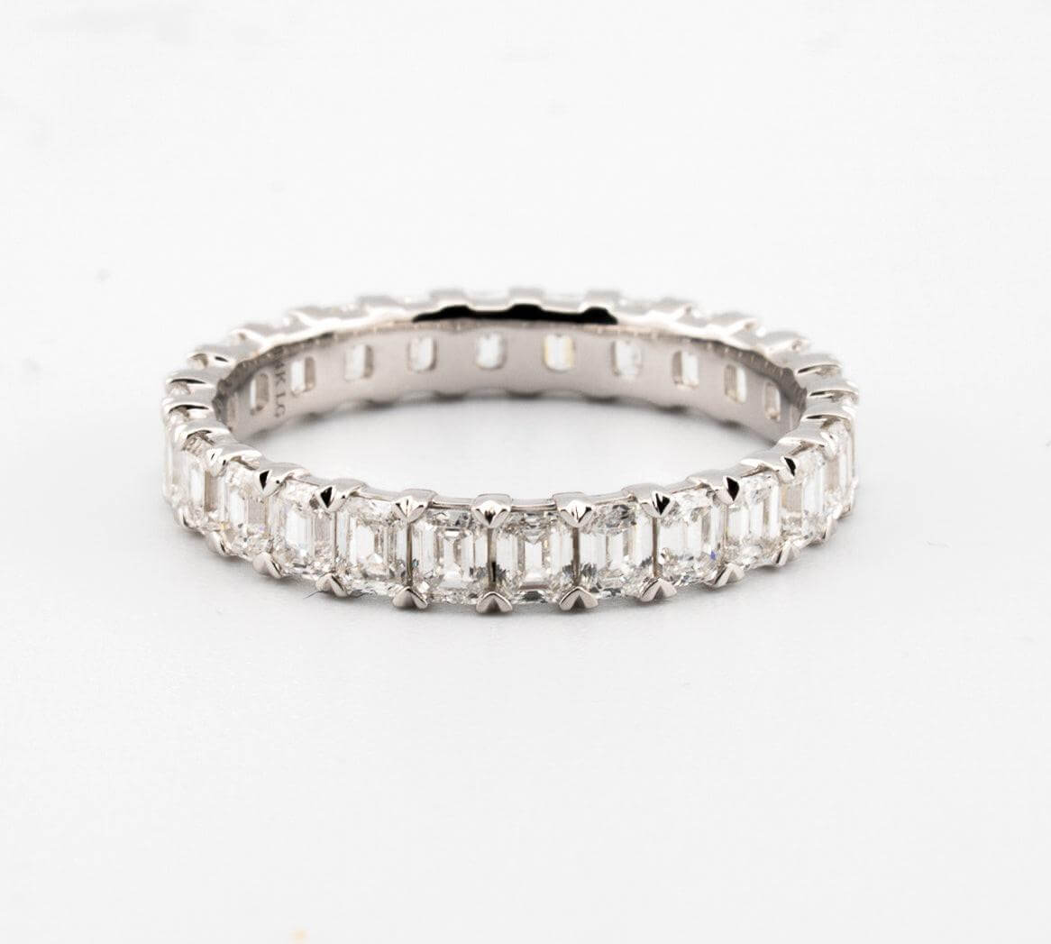 Emerald Lab Eternity Ring featuring lab grown diamonds in a stunning 14kt white gold setting.